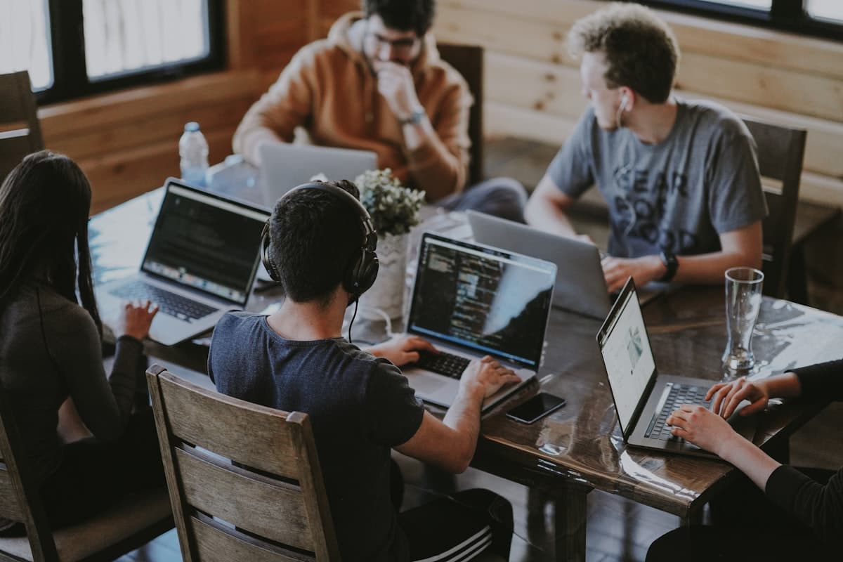 The PlanetMatrix team collaborating in the office